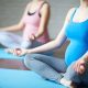 pregnant women doing yoga